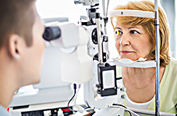 Woman getting her eyes examined