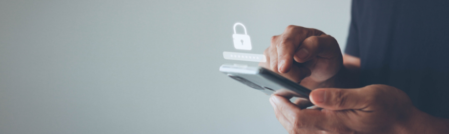 Person holding phone, with padlock and password icons floating above screen